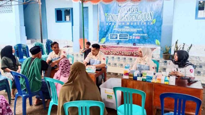 Umc Petugas medis UMC periksa kesehatan warga gratis di Yayasan Raudatus Sholihin Kotaraja untuk persiapan menyambut bulan suci Ramadhan.